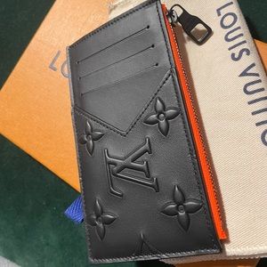 LOUIS VUITTON M80827 BLACK AND ORANGE- no longer made!!
